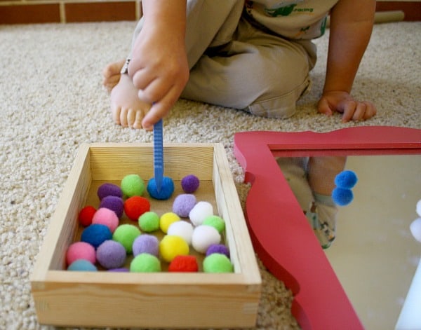 Toddler Activities: Play with Cardboard Tube and a Mirror - Buggy and Buddy