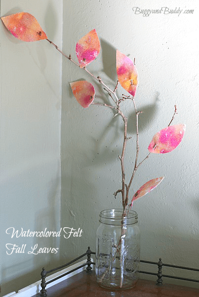 Love the combination of natural objects with this unique art technique! (Fall Crafts for Kids: Watercolored Felt Fall Leaves~ BuggyandBuddy.com)