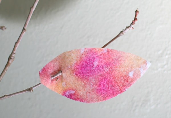 make snips in your felt leaf and attach it to a twig