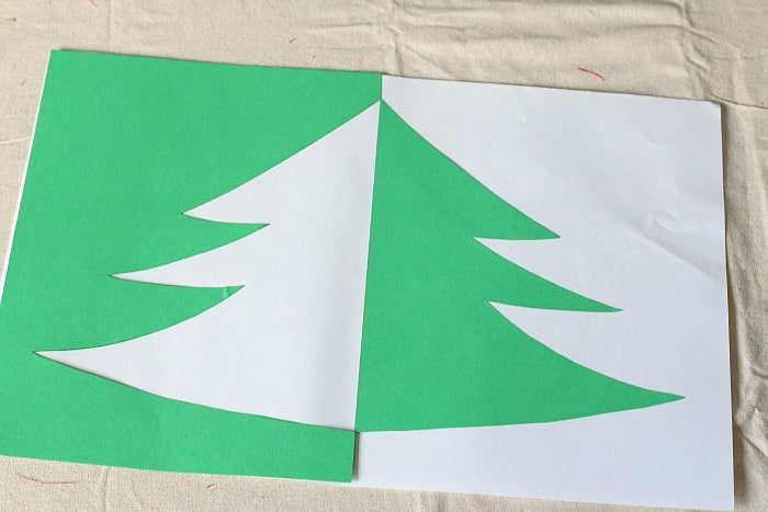 positive negative space christmas tree art project for kids