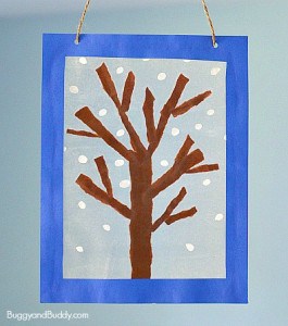 Winter Tree Suncatcher Craft for Kids using tear art and cotton swab painting- a fun winter art project for preschool, kindergarten, and elementary! ~ BuggyandBuddy.com