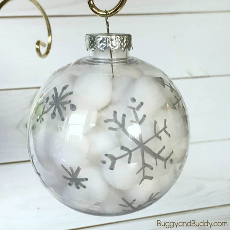 Winter Snowflake Ornament Craft for Kids: Use pom poms and clear plastic bulbs to make these easy and quick Christmas ornaments. Great fine motor practice and perfect for kids of all ages (toddler, preschool and up!)