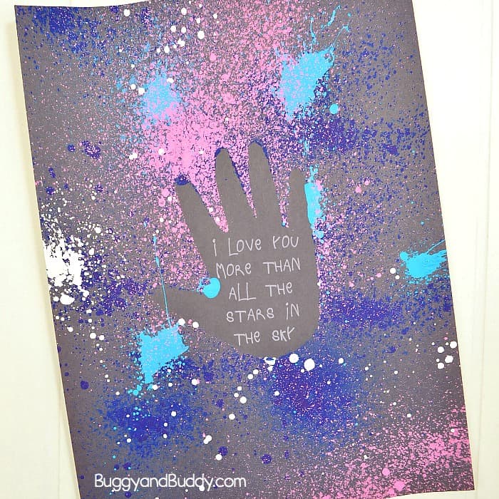 Galaxy Handprint Art for Kids: Process Art Resist Technique Using spritzer or spray bottles. Great for Mother's Day or Father's Day or just for fun!