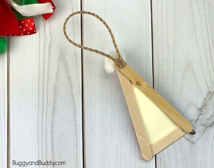 glue string to the back of your ornament